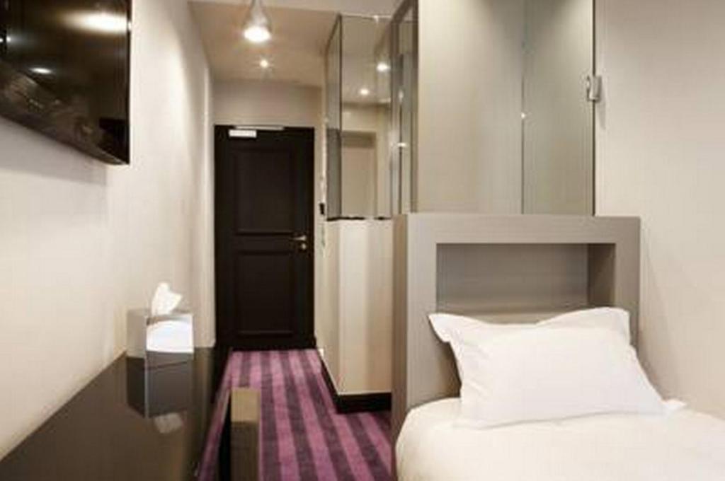 Le Paris Singulier Hotel Værelse billede
